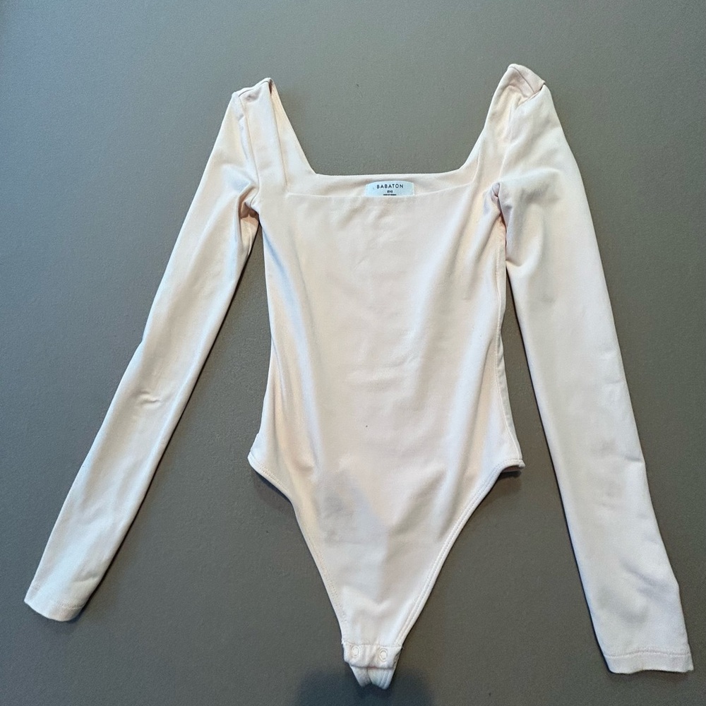 Aritzia Babaton pale pink, nude Long Sleeve bodysuit with square neck.